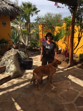 Robin and one of our pups on patio